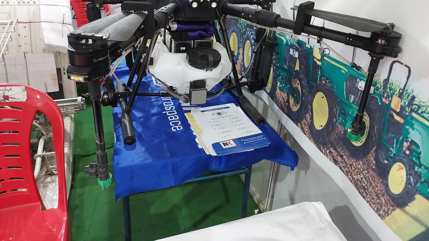 Agricultural spraying drone over a field near Indore