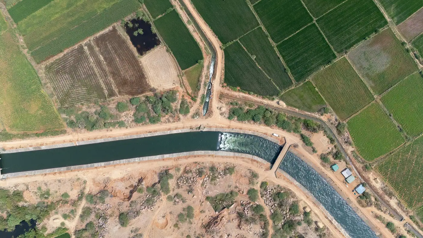 Aerial view of an irrigation canal and farmland in Karnataka